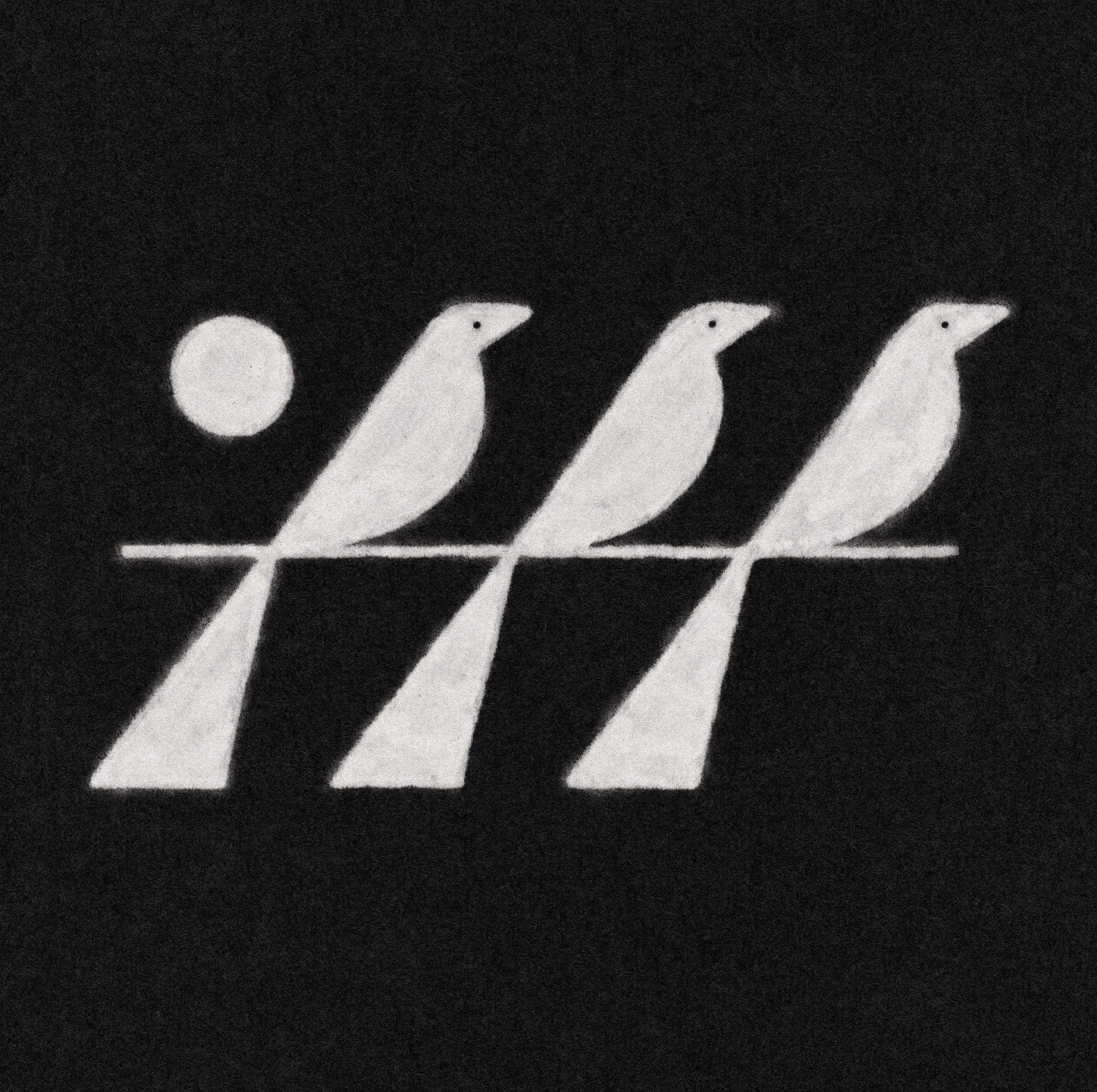 Three birds on a wire against a night sky